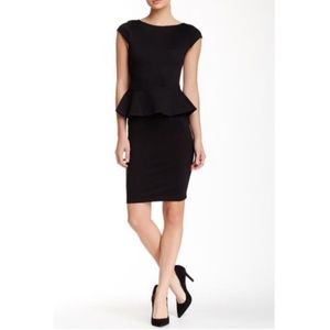 Peplum Fitted Dress in Black Size S